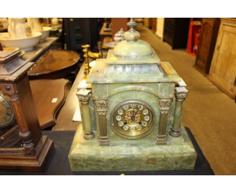 An onyx two hol mantel clock, AF and an oak cased mantel clock, AF