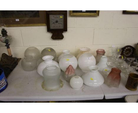 A quantity of various glass oil lamp shades