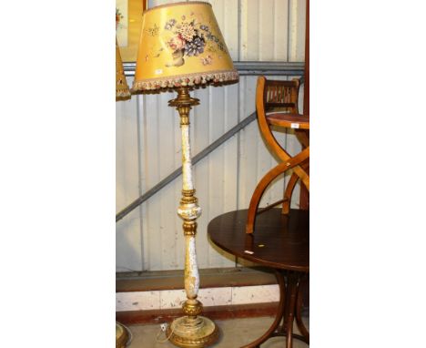 A floral hand painted wooden standard lamp and shade
