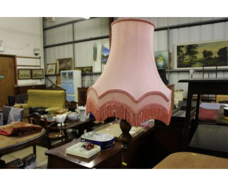 An oak standard lamp and shade