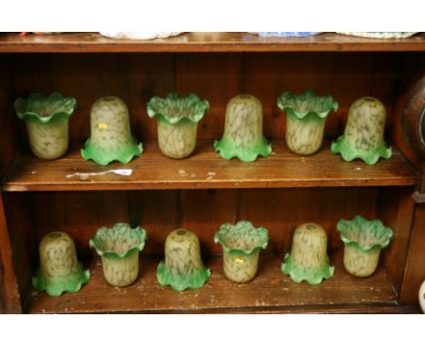 Twelve green glass light shades