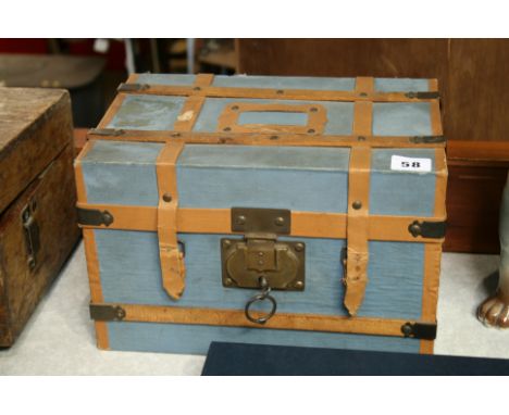 A small travelling cabin trunk