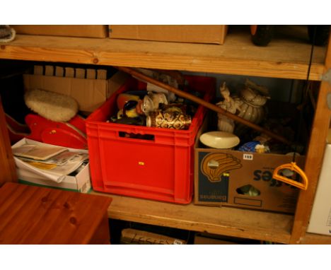 Shelf of assorted china, books, child's push bike etc.