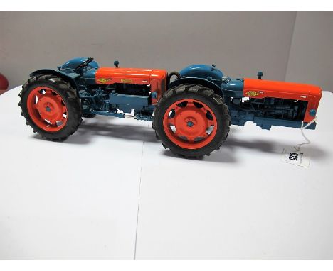 A Universal Hobbies 1:16th Scale Diecast Doe Triple D Four wheel Drive Tractor Model, has been displayed and would benefit fr