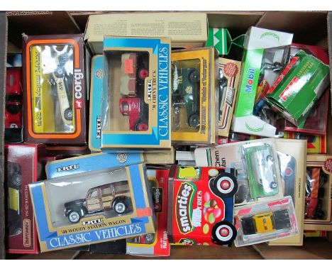 Approximately Forty Diecast Vehicles of Different Scale by Matchbox, Corgi, E.R.T.L, Lledo, including Corgi #804 1952 Jaguar 