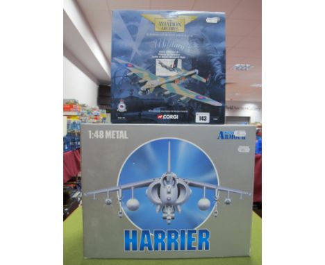 A Boxed Collection Armour 1:48th Scale Diecast Model Military Aircraft, #98118 Harrier AV8 B U.S. Marines. A boxed Corgi 1:14