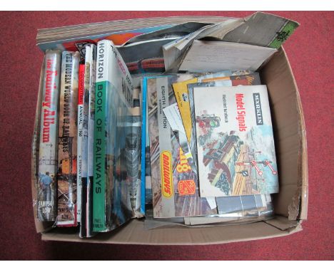 A Box Containing a Selection of Railway Related Books, and a large quantity of model train catalogues for Marklin, Hornby, Tr