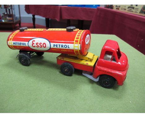 A Wells Brimtoy Tinplate Friction Drive ESSO Petrol Tanker, all complete with rear taps, and crack in roof ladder, condition 