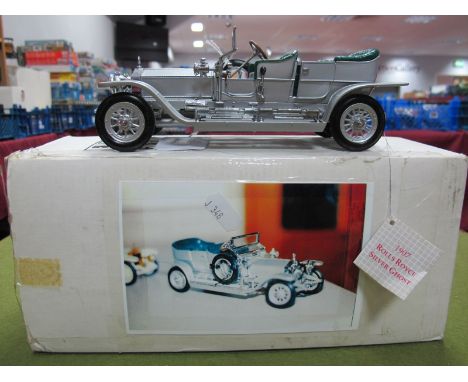 Franklin Mint 1:24th Scale Diecast Model 1907 Rolls Royce Silver Ghost, with accompanying literature. Boxed.  