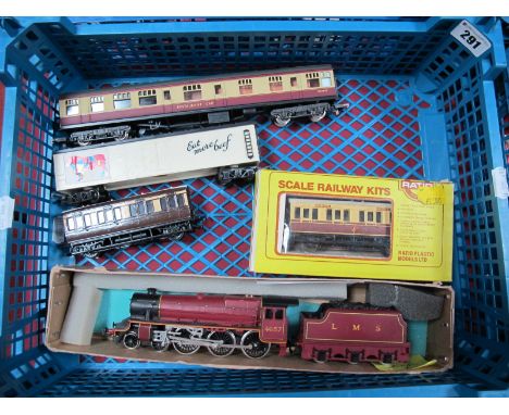 A Hornby "OO" Gauge 4-6-0 Locomotive R/N 4657 and Six Wheel Powered Tender, LMS maroon livery. Together with Lima "OO" Gauge 