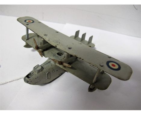 An Original Dinky #60H 'Singapore' Flying Boat, in pale grey, hollowed box, transfer roundels, four two blade props, gliding 