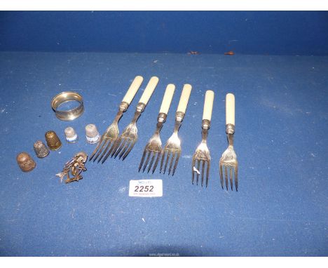 A small quantity of silver including a set of six forks with Sheffield 1927 silver band, silver napkin ring, Chester 1920, si