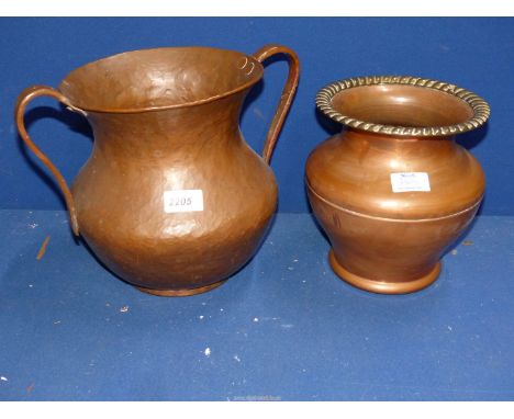 A baluster shaped copper Urn, hand beaten with two handles 10" tall, and a copper Jardiniere with a brass rim, 8" tall.