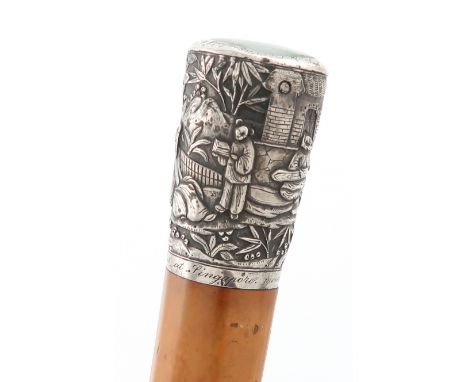 A 19th century Chinese silver-mounted jadeite walking cane, Canton 1886, tapering Malacca shaft, the handle chased with Chine