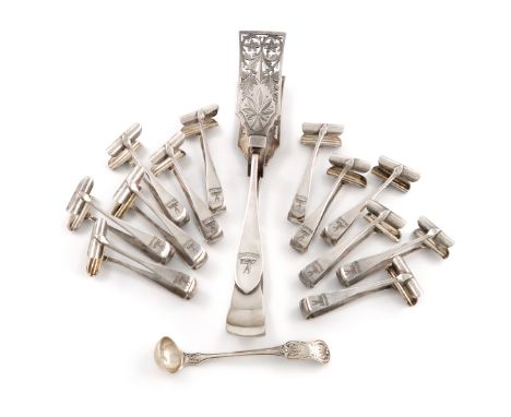 A set of twelve silver asparagus eaters and a pair of a serving tongs, by Walker and Hall, Sheffield 1913, plain tong form, t