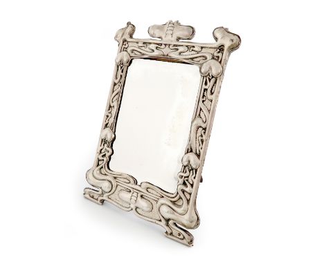 An Edwardian Art Nouveau silver mirror, by William Neale, Chester 1903, upright rectangular form, with stylised sinuous decor
