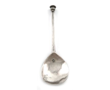 An Elizabeth I provincial silver Seal-top spoon, marked in the bowl with a pelleted five petal mark, possibly East Anglian, a