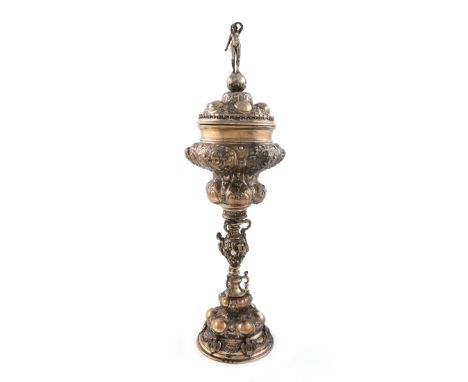 A late 19th century German silver-gilt standing cup and cover, with import marks for London 1900, importer's mark of William 