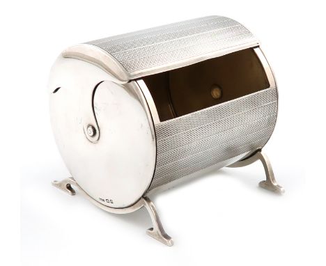 A silver cigarette box, by S. Mordan and Co, London 1928, patent no. 281515, cylindrical form, engine-turned decoration, hing