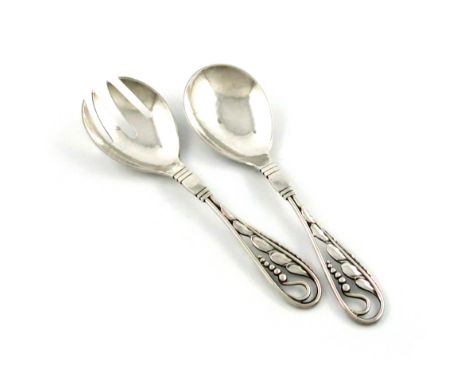 Designed by Georg Jensen, a Danish silver serving fork and spoon, with import marks for London 1931, importer's mark of Georg