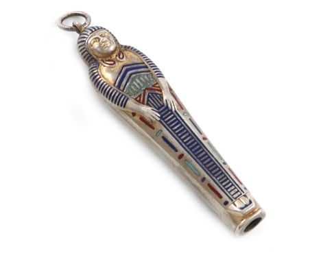 A novelty silver-gilt and enamel propelling pencil, unmarked, modelled as an Egyptian Mummy, with a ring attachment, length c