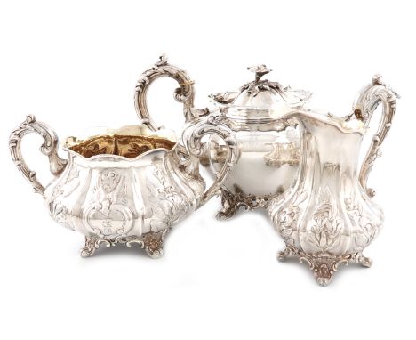 λA matched three-piece Victorian silver tea set, the tea pot by The Barnards, the cream jug and sugar basin by Joseph &amp; A