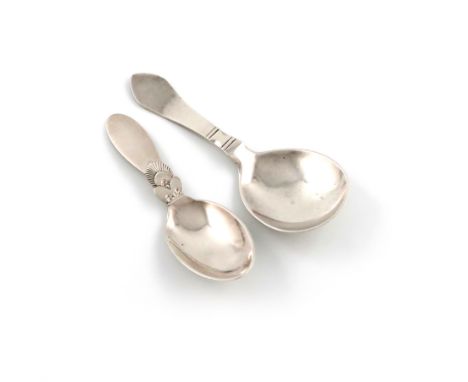 Designed by Gundorph Albertus for Georg Jensen, a Danish silver Cactus pattern caddy spoon, oval bowl, the reverse of the ste