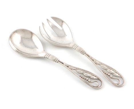designed by Georg Jensen, a Danish silver serving spoon and fork, with import marks for 1931, importer's mark of George Stock