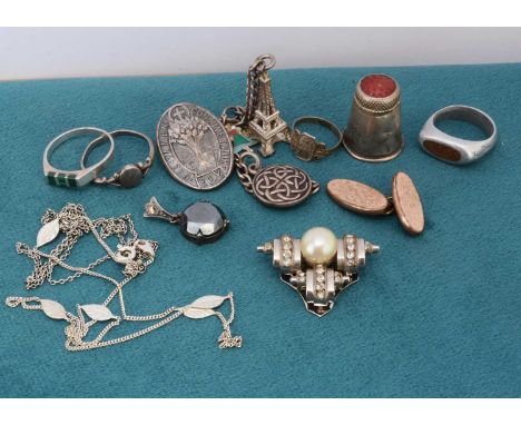 A quantity of silver base metal jewellery, including charm bracelet, WWI trench art ring marked YSER and other items