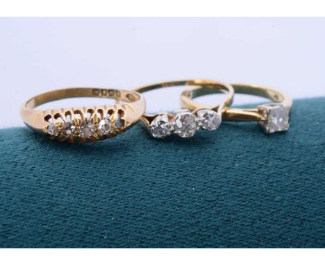 Three 18ct gold diamond dress rings, including a five stone example, one setting vacant, ring size P, a three stone example, 