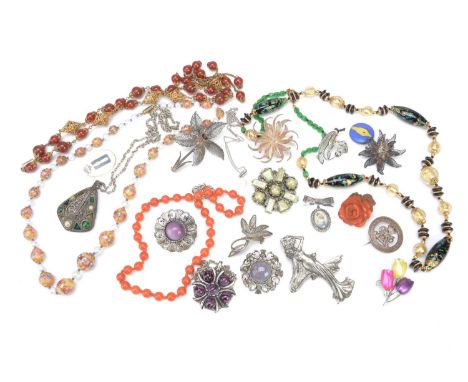 A small quantity of costume jewellery, including some silver items, a WWI wound badge, a silver filigree flower brooch, a pin