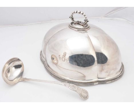 A late Victorian silver plated food cover by Elkington & Co, 35cm wide, together with a silver plated ladle (2)