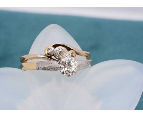 Two 18ct gold and diamond set rings, including a diamond solitaire in platinum setting, ring size O, diamond 0.40ct, and a cr