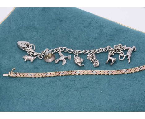 A 9ct gold three colour gold bracelet, with tongue and box clasp, 19cm, 9g together with a silver charm bracelet having seven