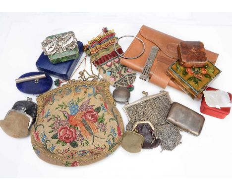 A collection of silver and silver plated items, including a continental white metal mesh purse, a silver cigarette case, a sm