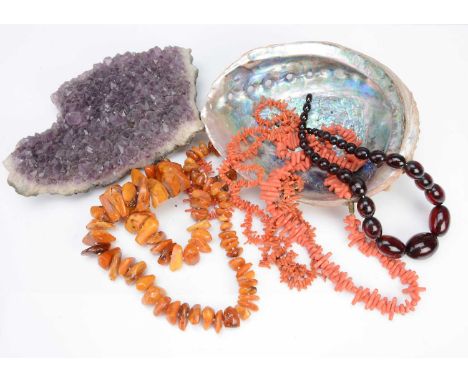 A quantity of organic gems, including a ''cherry amber'' bead necklace, 60g, a rough boulder Baltic amber necklace, 139g, cor