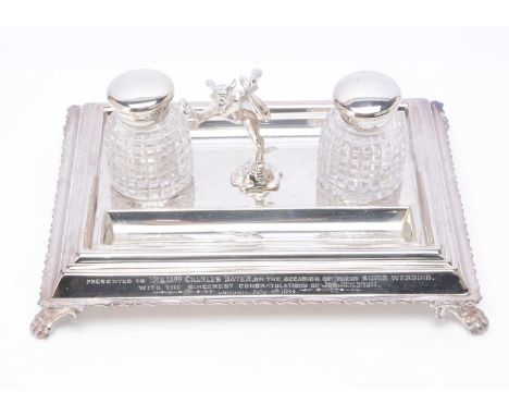 A nice late Victorian silver plated desk inkstand by Mappin &amp; Webb, with engraved presentation inscription, having figure