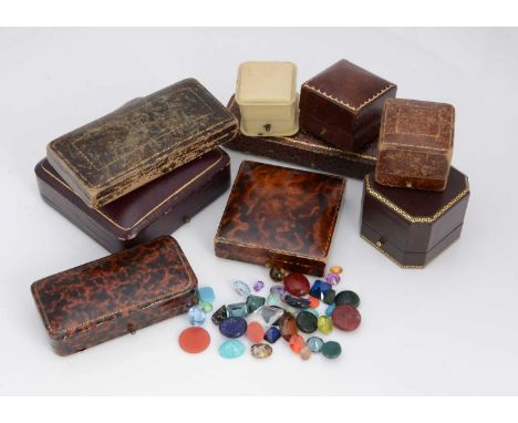 A quantity of loose gem stones, some cased, and a small quantity of vintage leather and gilt tooled, and ivorine jewellery bo