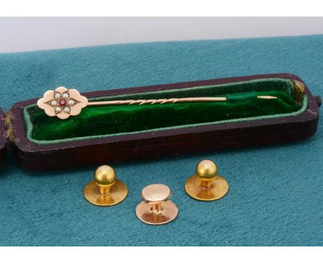 A pair of early 20th Century 18ct gold dress studs, together with a French dress stud with engraved decoration, 18ct, 2.4g to