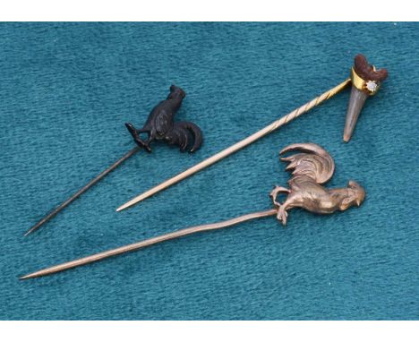 An Edwardian gold and diamond stick pin set with a pre historic white shark tooth, 5.7cm, 1.4g together with two base metal c