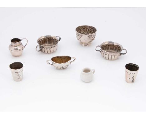Seven miniature 19th & 20th century silver dolls' house items, including a pair of twin handled porringers, 4.7cm wide, a mil