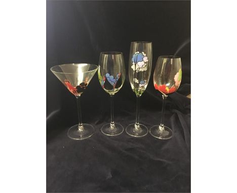 Four Clarice Cliff glasses to include two wine, one Martini and one champagne glass.