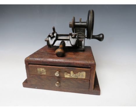 A PORTABLE ANTIQUE YALE No. M1005 KEY CUTTING MACHINE, set of two drawer base, complete with keys and tools