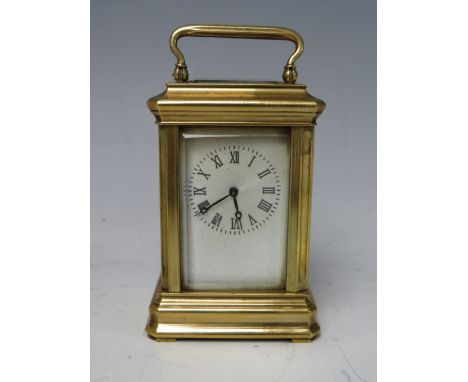 A MODERN FIVE GLASS BRASS CASED MINIATURE CARRIAGE CLOCK, the enamel dial with Roman numerals, impressed number 3012 to movem
