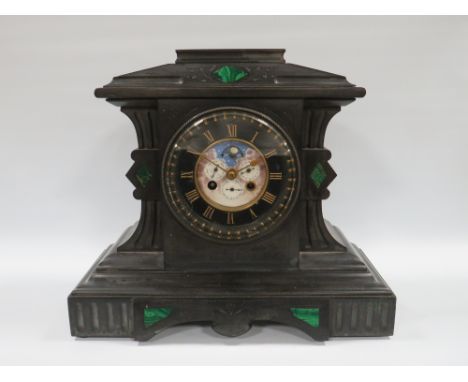 A FRENCH EIGHT DAY DATE CALENDAR MANTLE CLOCK, set in a black slate case, the 8 day movement signed Marti, having a painted e