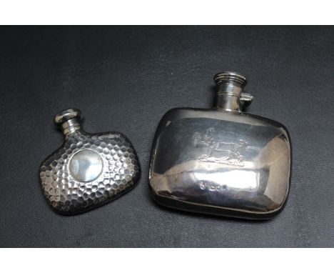 A HALLMARKED SILVER HIP FLASK BY RICHARDS &amp; BROWN, date letter indistinct, together with a smaller hammered finish exampl