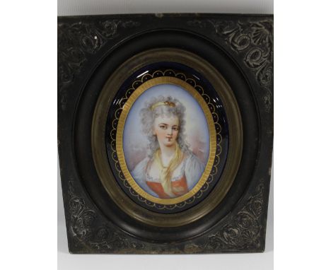 A 19TH CENTURY OVAL PORTRAIT STUDY OF MADAME DE GENLIS, (see verso), on ceramic panel, unsigned, framed in decorative frame, 