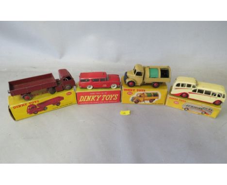 A COLLECTION OF DINKY VINTAGE DIE CAST VEHICLES, to include Dinky 257 Canadian Fire Chiefs car, Dinky 252 Refuse Wagon, Dinky