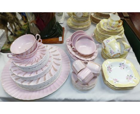 A Shelley fluted part tea set in floral and gilt, 36 pieces approx; a 1930's floral part coffee set; a Minton part dinner ser