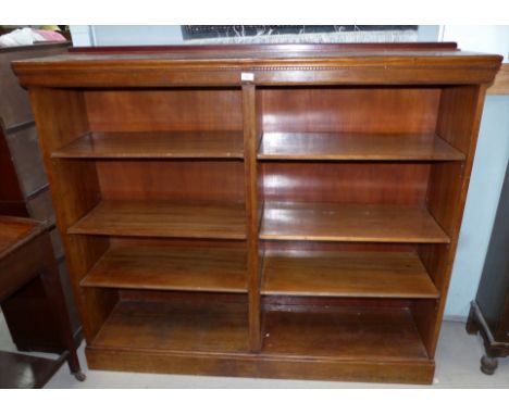 An Edwardian walnut side-by-side 6 shelf bookcase